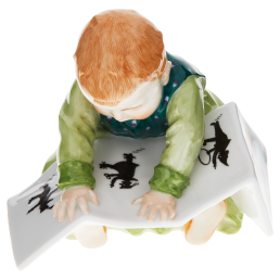 Sitzendes Kind mit Bilderbuch, Bunt staffiert, H 10 cm